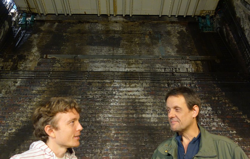 Composer Iain Chambers and sound recordist Ian Rawes on site comparing notes. Poorly-focused photography by me. 